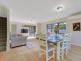 A dining area with a table and chairs at Roy-Al Retreat - Riwaka Holiday Home in Riwaka