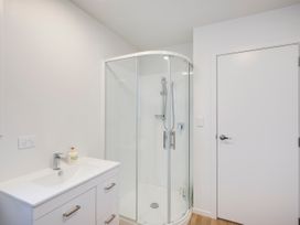 A bathroom with a shower and sink at Mayfair Haven - Hastings Holiday Home in Hastings