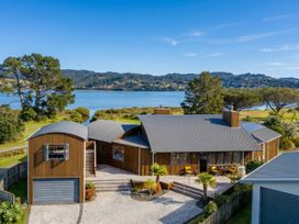 A house with a view of a river at Ocean Breeze Family Haven - Pauanui