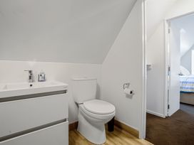 A bathroom with a sink and toilet at Urban Oasis - Christchurch Holiday Home Christchurch