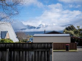 A view of mountains from a neighborhood at Quiet on Quintin - Te Anau Holiday Home Te Anau