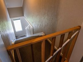 A stairwell with stairs and a window at JOE'S Getaway - Omori Holiday Home, Omori