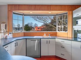 A kitchen featuring a sink, dishwasher, and microwave at JOE'S Getaway - Omori Holiday Home, Omori