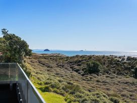 A view of the sea and island from a balcony at Sunbrae Sands - Mount Maunganui Holiday Homes