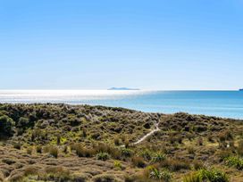 A view of the ocean and island near Sunbrae Sands - Mount Maunganui Holiday Homes Mount Maunganui