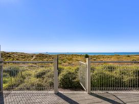 A view of the ocean and coastline at Sunbrae Sands - Mount Maunganui Holiday Homes Mount Maunganui