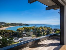 An outdoor area with a view of the beach at Langs Beach Holiday Home in Langs Beach