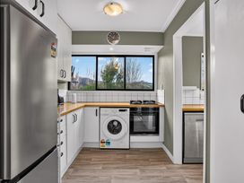 A kitchen with appliances and a countertop at Surf House - Mangawhai Heads Holiday Home in Mangawhai Heads