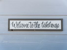 A welcome sign to the lakehouse at Hampton Cottage by the Lake - Taupo Holiday Home Taupo Central