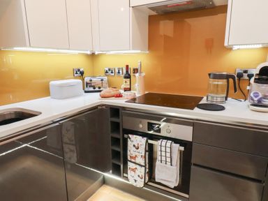 A kitchen with appliances and utensils at Evening Star @ Engine Shed in Whitby