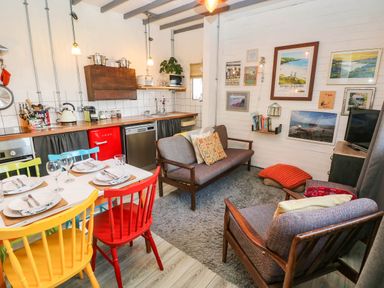 A kitchen with dining area at Cattle Shed near Narberth