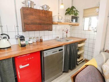 A kitchen with a sink and appliances at Cattle Shed near Narberth