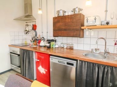 A kitchen with various appliances and storage at Cattle Shed near Narberth