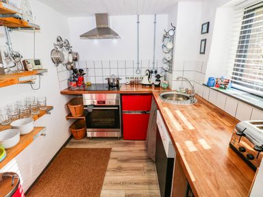 A kitchen with appliances and utensils at Milking Shed near Narberth