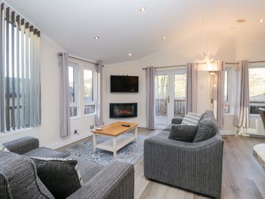 A living room with a sofa and coffee table at Heights View 