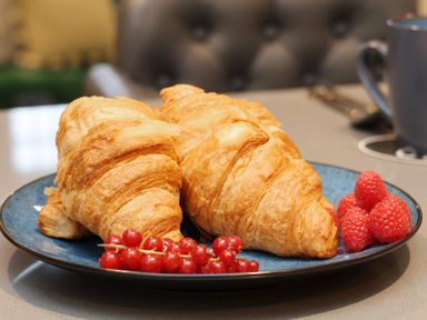 A plate with two croissants and berries at Premier, Transit &amp; Lady Hilda @ Engine Shed, Whitby