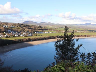 A view of a beach and countryside at Pen Y Garth in Mynytho near Llanbedrog
