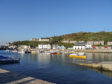 A harbor with boats and buildings at Kernyk Rinsey near Porthleven