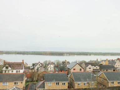 A view of houses by the water at Preswylfa in Caernarfon