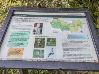 An information board about King Alfreds Tower with text images and a map at Stourhead