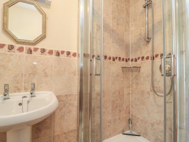 A bathroom with a sink and shower at Willow Barn in Cucklington near Wincanton