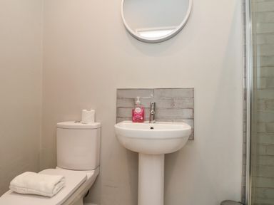 A bathroom with a sink and toilet at Royal Victoria House Scarborough