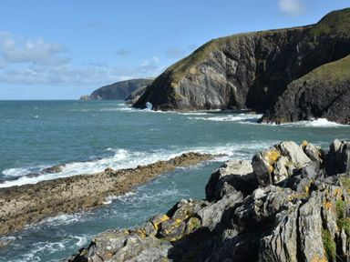 A rocky coastline with waves and cliffs at Gellifor in St Dogmaels Pembrokeshire