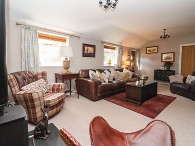 A living room with sofas and a coffee table at 1 Church Barns Pocklington