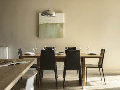 A dining room with a table and chairs at Take Five in Ambleside