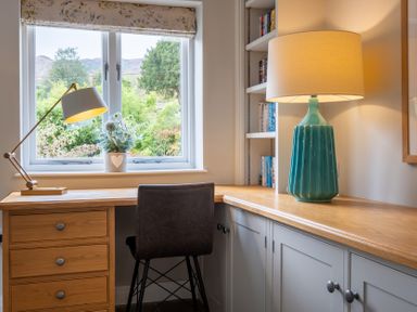 A home office with a desk and chair at Goody Raise in Grasmere