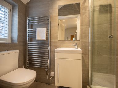 A bathroom with a sink and shower at Goody Raise in Grasmere
