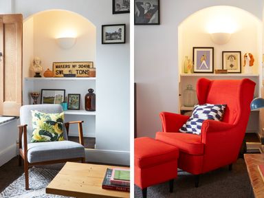A seating area with a gray armchair and a wooden coffee table with books and a red wingback chair with an ottoman and cushions at 1 Pringles Yard in Alnwick