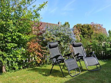 Two deck chairs in a garden at Crooked Well Timsbury, Nr Bath