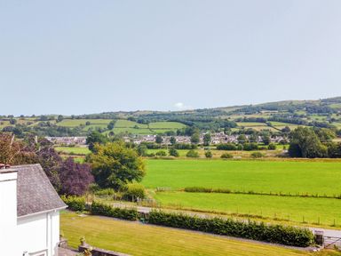 A view of greenery and houses at Pengwern in Llanrwst