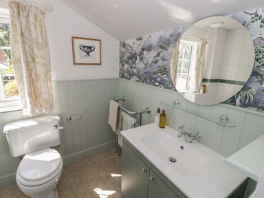 A bathroom with a sink and toilet at Heath Cottage Stratford-Upon-Avon