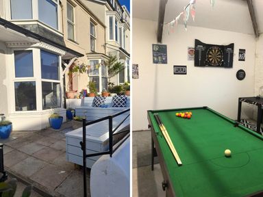 An outdoor patio area with potted plants and seating and an indoor game room with a pool table and dartboard at Bryn Derfel in Borth-y-Gest near Porthmadog