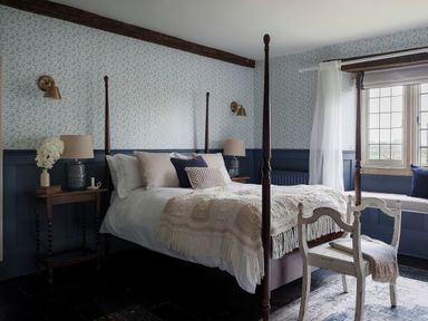 A bedroom with a bed and bedside table at Reybridge House in Lacock