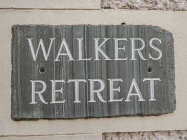A sign with the text Walkers Retreat at Walkers Retreat in Keswick