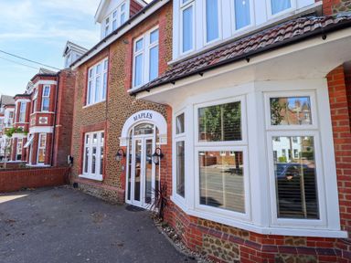 A building exterior with an entrance at Maples in Hunstanton