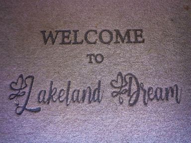 A welcome mat with the text Welcome to Lakeland Dream at Lakeland Dream @ South Lakeland Leisure Lodge in Warton