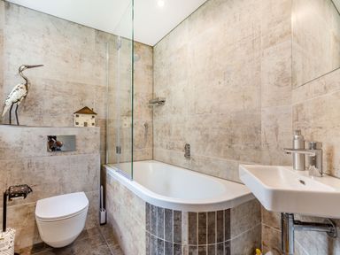 A bathroom with a toilet sink bathtub and shower at Armando in Devoran Cornwall