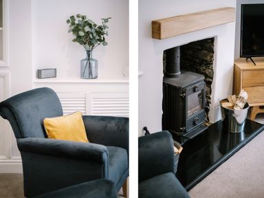 A chair with a yellow cushion near a wood stove with a bucket of firewood at Craig Cottage in Bowness-On-Windermere