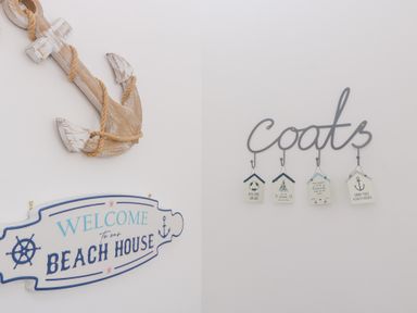 An entryway with anchor decor and coat hooks at 76A Mackworth Road, Porthcawl