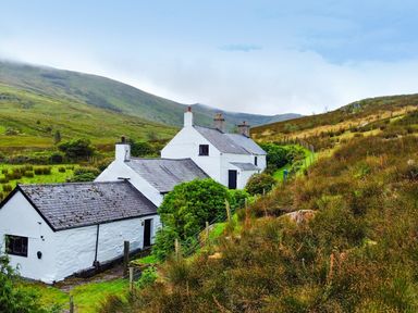 A cottage on a hillside at Cwm in Capel Curig