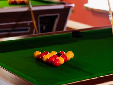 A pool table with arranged snooker balls at Lupin Cottage Akeld near Wooler