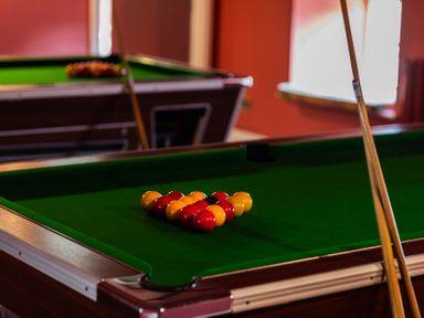 A pool table with balls arranged at Lupin Cottage Akeld near Wooler
