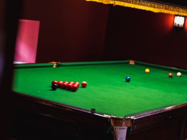 A snooker table with balls arranged at Lupin Cottage Akeld near Wooler