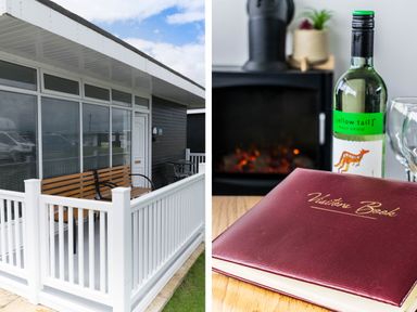An outdoor patio with wooden bench and white railing next to a white door and a close up of a wine bottle and visitor book near a fireplace at 57 Cherry Park in Chapel St Leonards