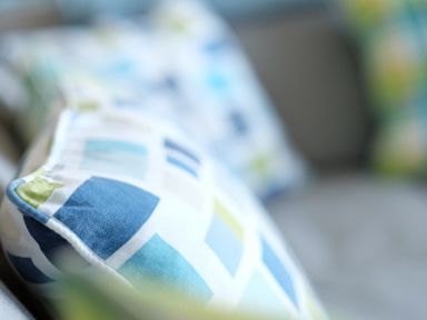 A close up of patterned cushions on a sofa at Halcyon Cove in Carbis Bay