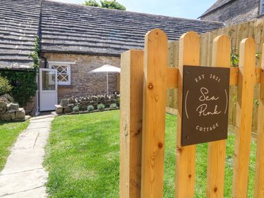 A sign at the gate of Sea Pink Cottage in Langton Matravers